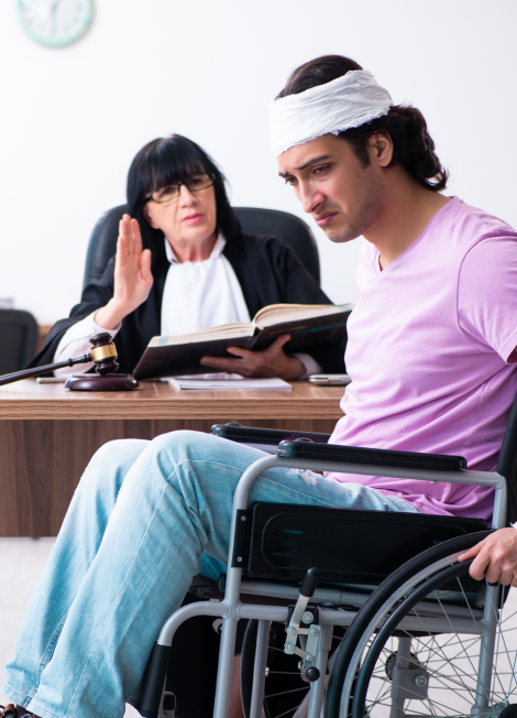 Disabled-man-consulting-judge-for-damages-litigation
